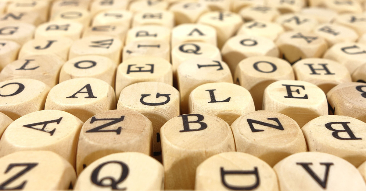 Wooden cubers with black capital letters